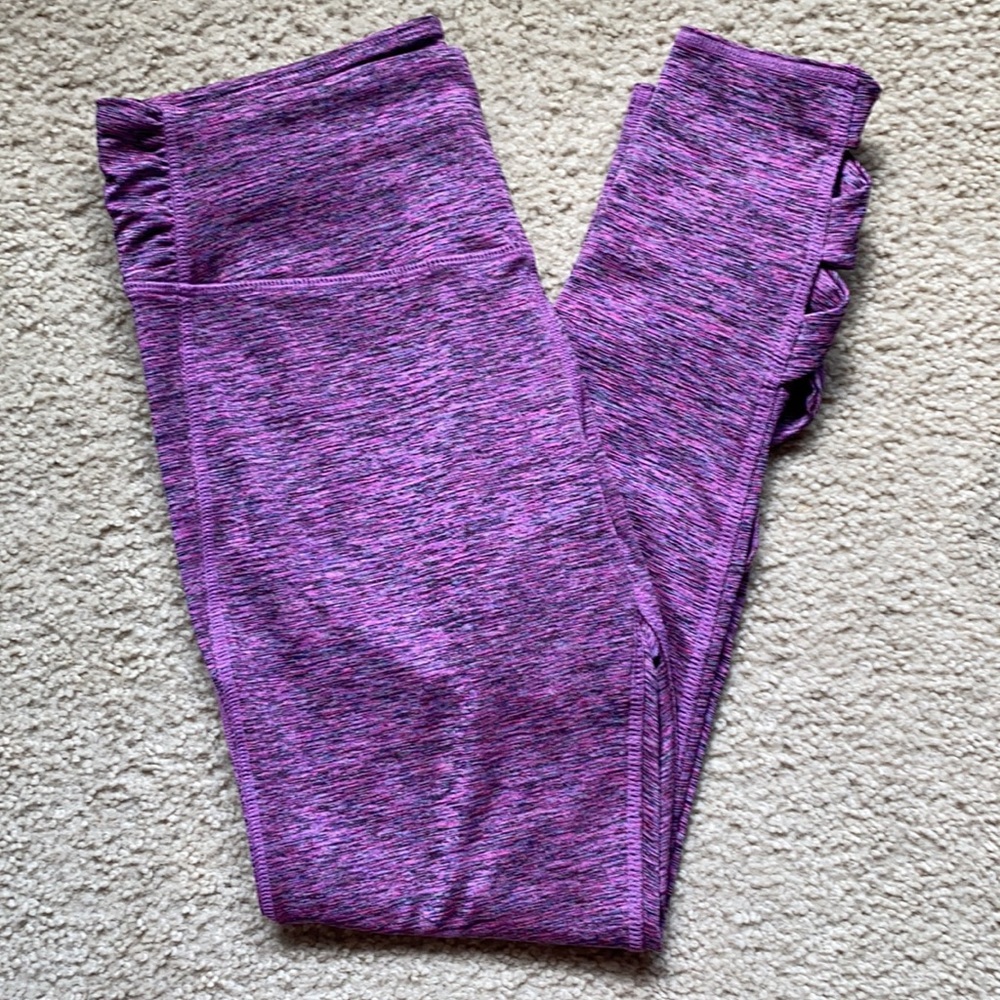 Pink/purple leggings with a cute design